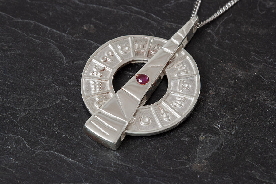 Spinning Sundial Pendant -July Birthstone Ruby