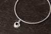 Plain bangle with charm