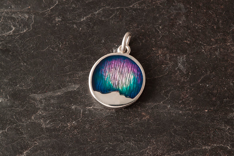Foula round charm