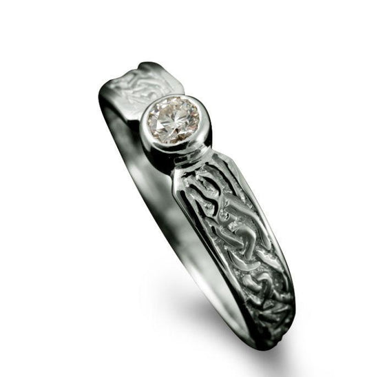 Celtic Diamond Ring with rub-over Diamond setting in Platinum